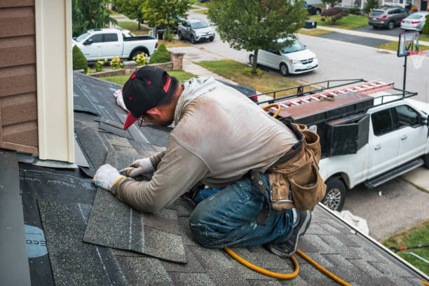 Professional Roofing technician working in Highland, IN